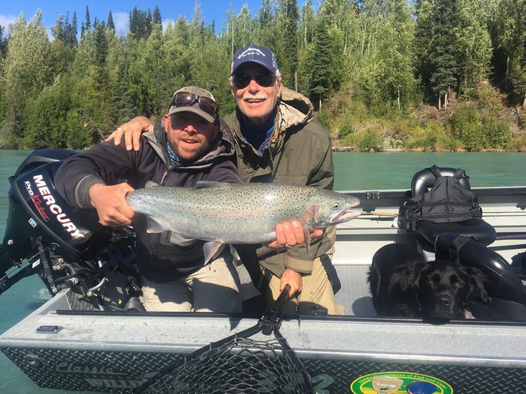 Guide and happy client with a kenai river Rainbow Trout