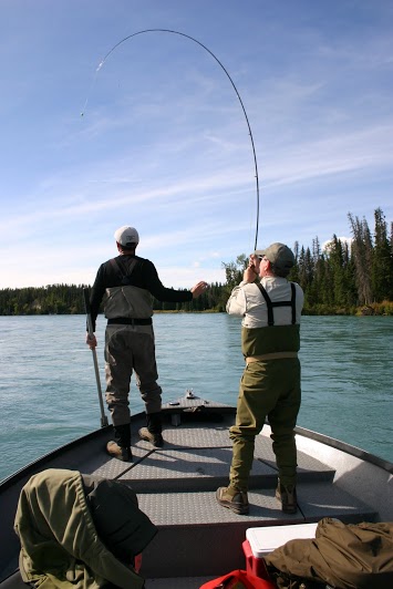 Fly fishing for Rainbow Trout on a power boat - Kenai River