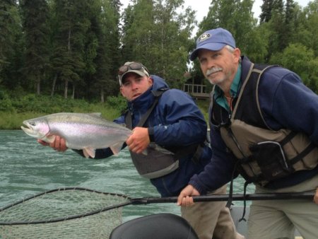 july fishing on the kenai river while on a guided fly fishing trip for trophy rainbow trout