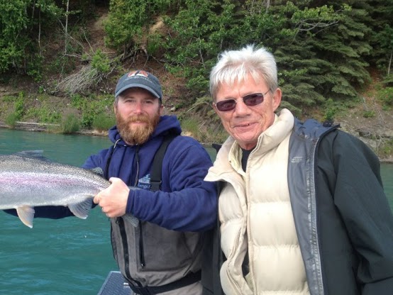 Kenai River Trophy Rainbow Trout. Guide and Happy Client holding fish
